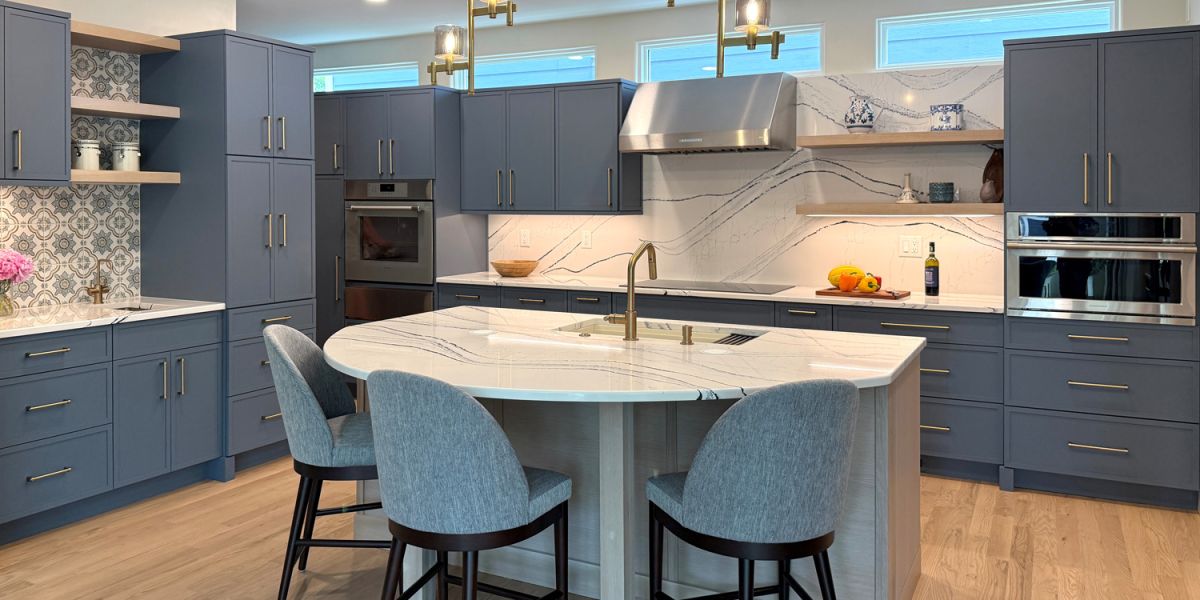White Oak And Smokey Blue Cabinets In Modern Kitchen Remodel With Upholstered Bar Stools